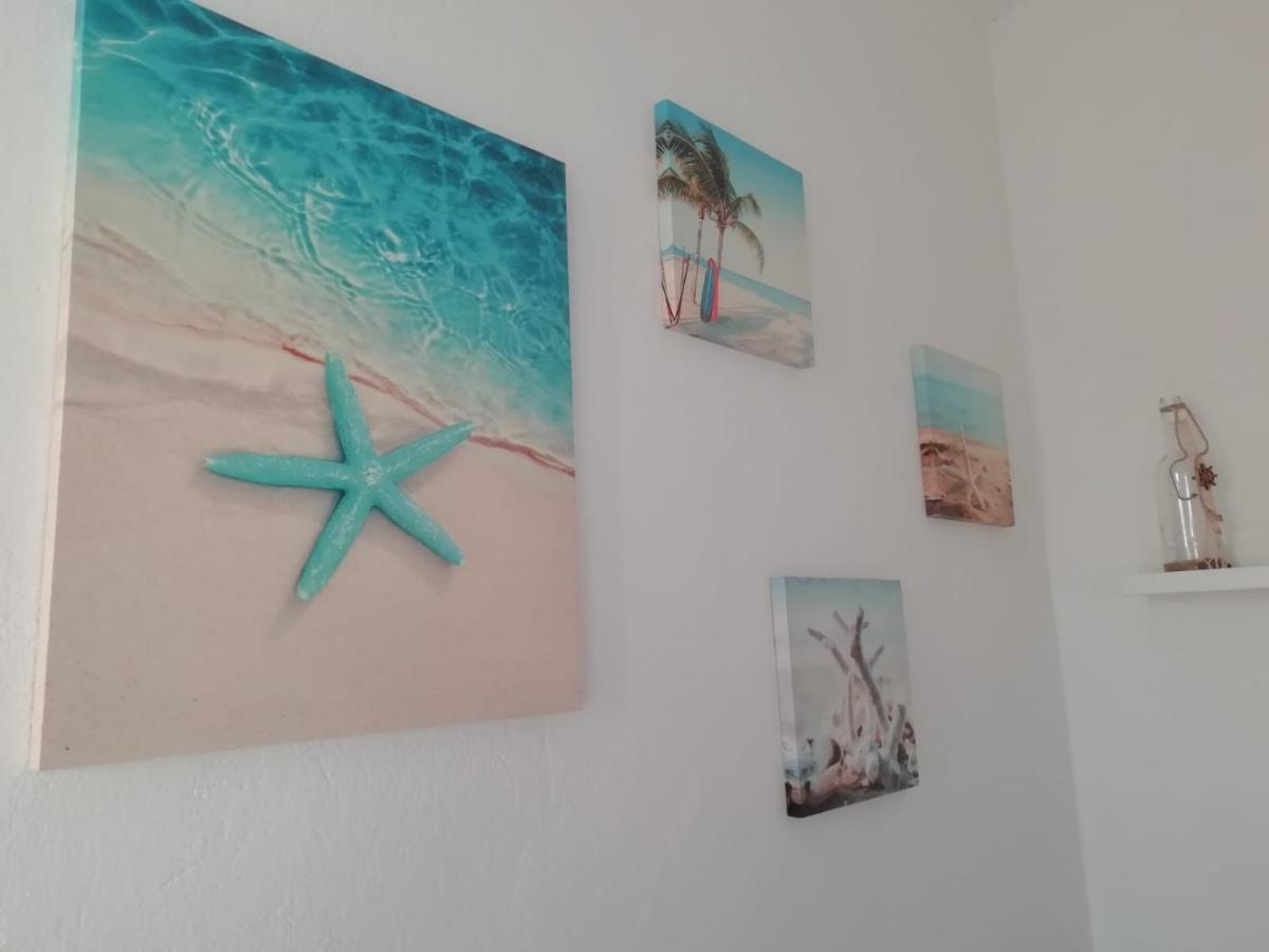 Prendas Antigas - Vacanze A Teulada Apartment Bagian luar foto